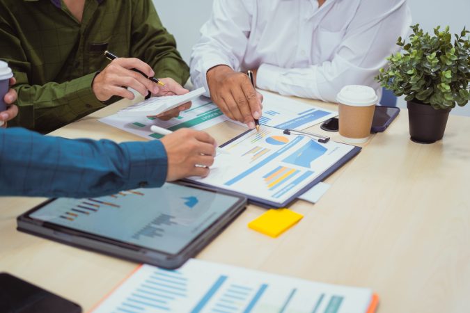 Close-up of a businessman in meeting office discussing topics related digital marketing management